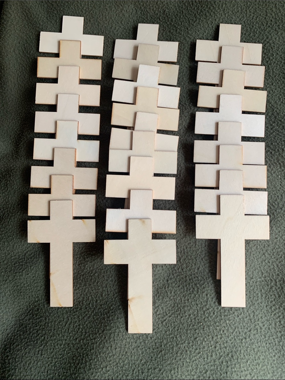 25 unfinished wood crosses cutouts. Size approximately 2.75โ x 4.25โ